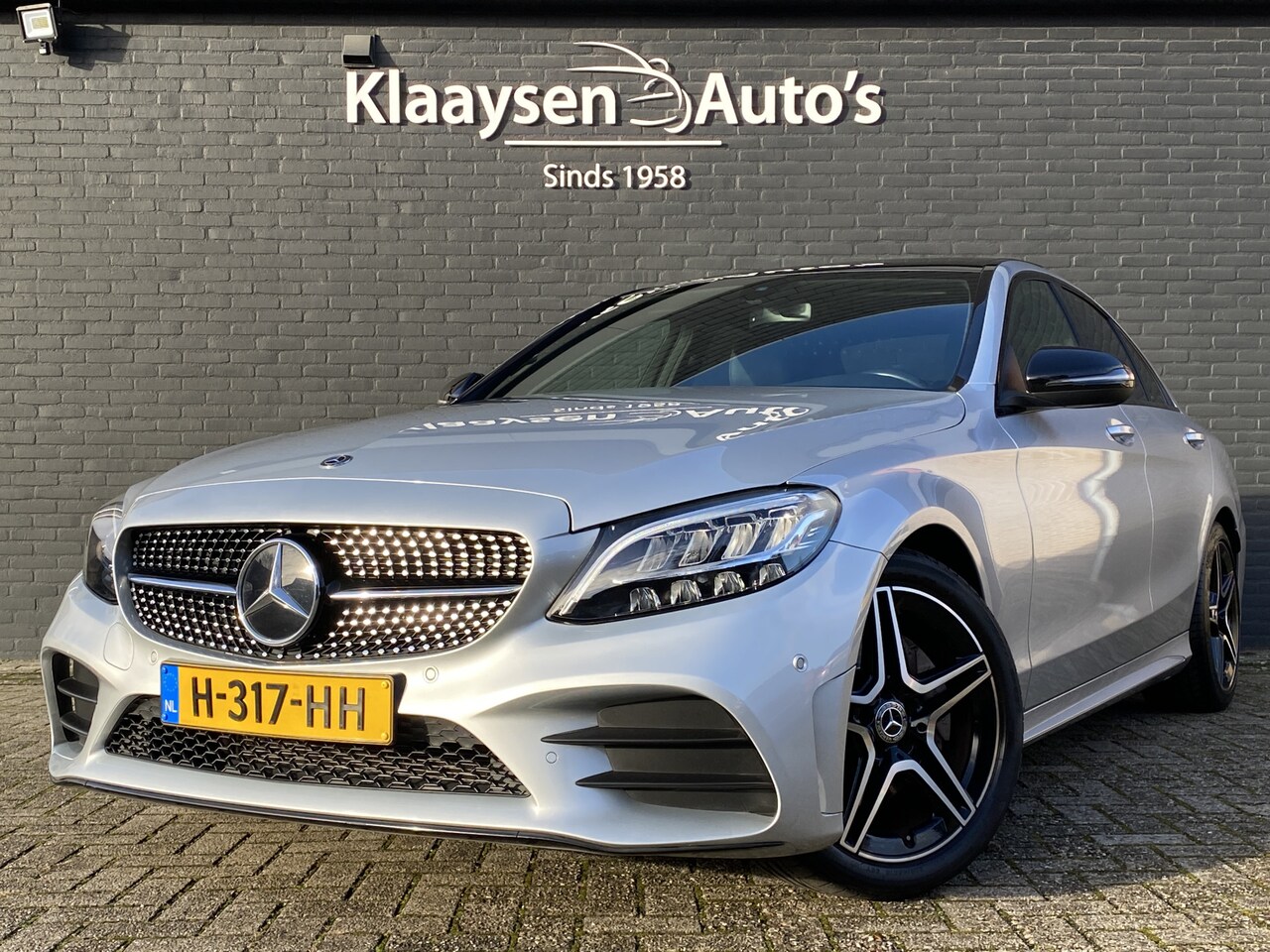 Mercedes-Benz C-klasse - 180 Business Solution AMG AUT. | dealer onderhouden | panoramadak | night pakket | apple c - AutoWereld.nl