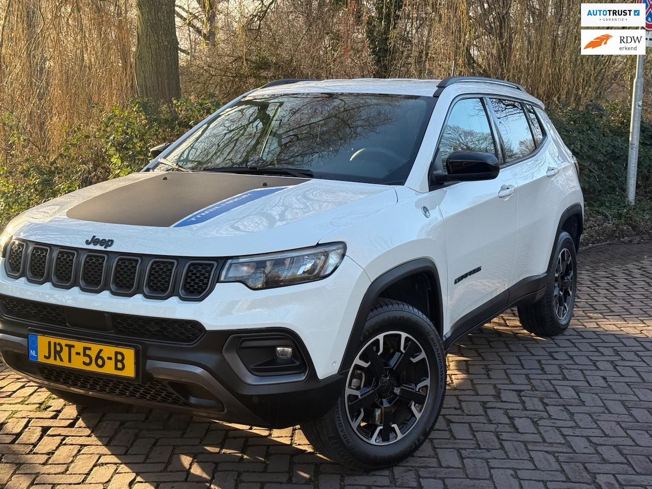 Jeep Compass - 4xe 240 Plug-in Hybrid Electric Trailhawk 1 Eig. b.j.3-2023 70000 km - AutoWereld.nl