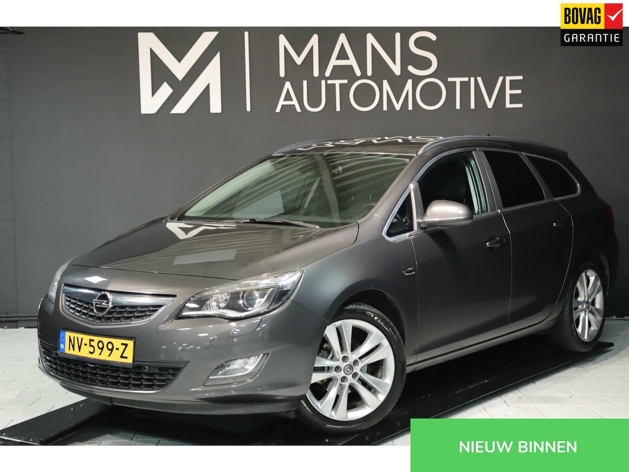 Opel Astra Sports Tourer - 1.4 Turbo Sport / XENON / CRUIS / PDC V+A / AIRCO / STOELVERW - AutoWereld.nl