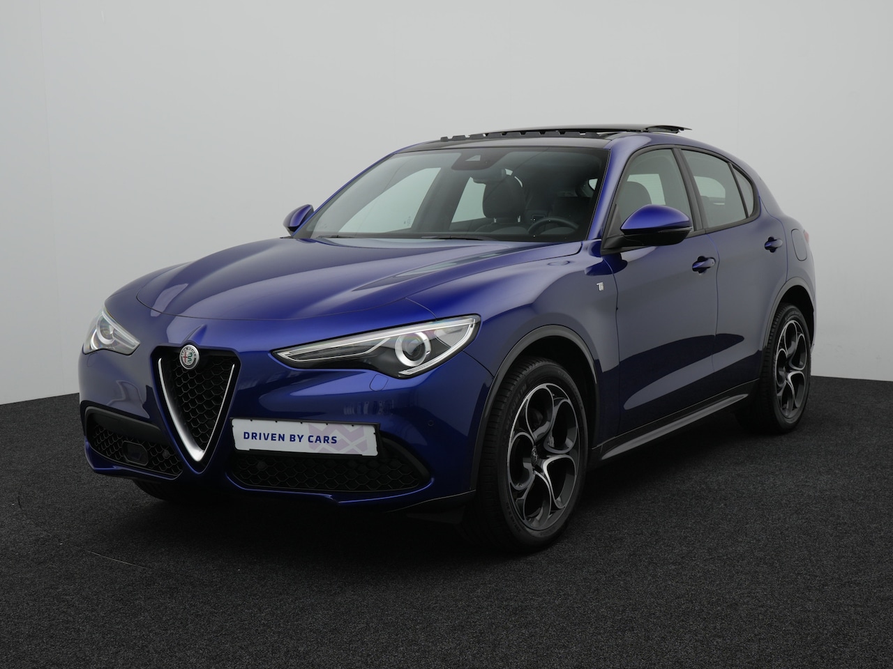 Alfa Romeo Stelvio - 2.0 T AWD Ti | Lederen bekleding | Panoramisch schuif/kanteldak - AutoWereld.nl