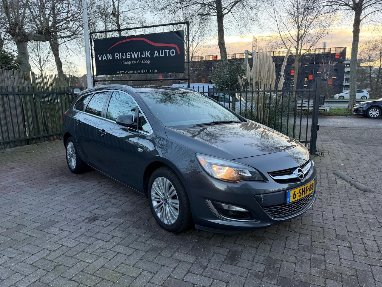 Opel Astra Sports Tourer - 1.4 Turbo Design Edition Navi Airco Trekh Dealer Ond - AutoWereld.nl