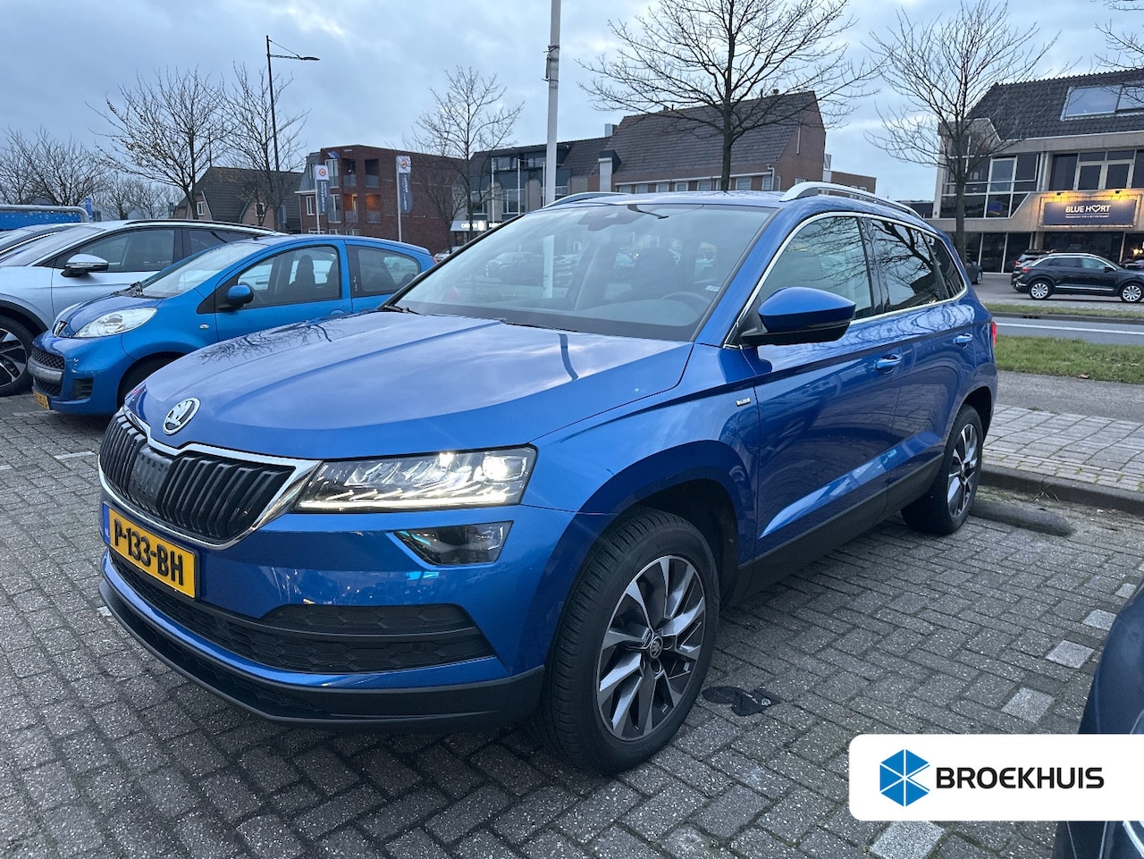 Skoda Karoq - 1.5 TSI 150PK DSG-7 Business Edition | PANORAMADAK | TREKHAAK | ELEKTR. A. KLEP | NAVIGATI - AutoWereld.nl