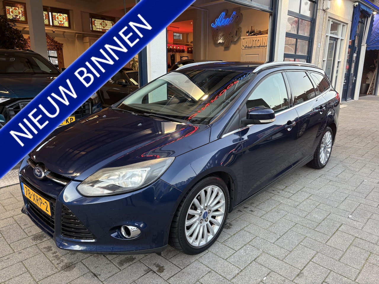Ford Focus Wagon - 1.0 EcoBoost Titanium CLIMA/NAVI/CRUISE/TELEFOON - AutoWereld.nl