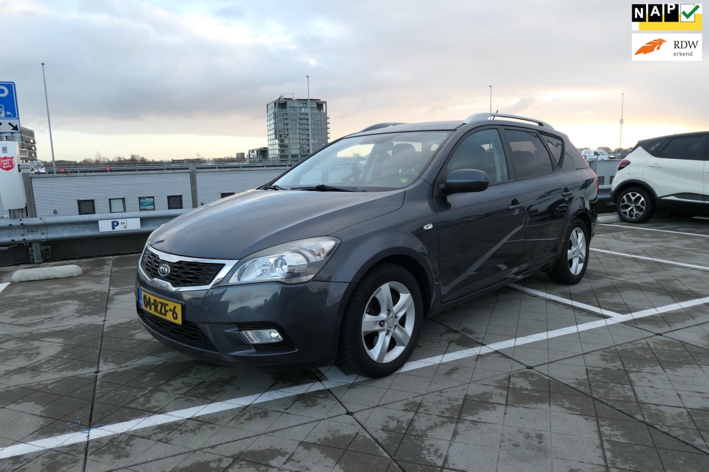 Kia Cee'd Sporty Wagon - 1.4 CVVT Seven Apk/Airco/Cruise/Nap/Boekjes/Velgen - AutoWereld.nl