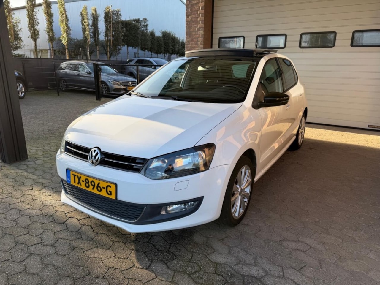 Volkswagen Polo - 1.4 Style Pano stoelverw. cruise navi PDC - AutoWereld.nl