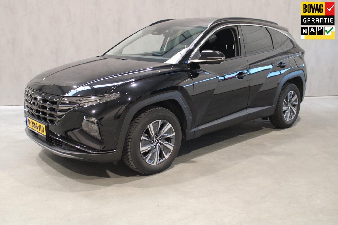 Hyundai Tucson - 1.6 T-GDI HEV Comfort Prijs is Rijklaar incl 12 maanden bovag - AutoWereld.nl