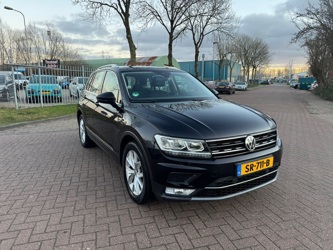 Volkswagen Tiguan - 2.0 TDI Highline automaat prijs ex bpm - AutoWereld.nl