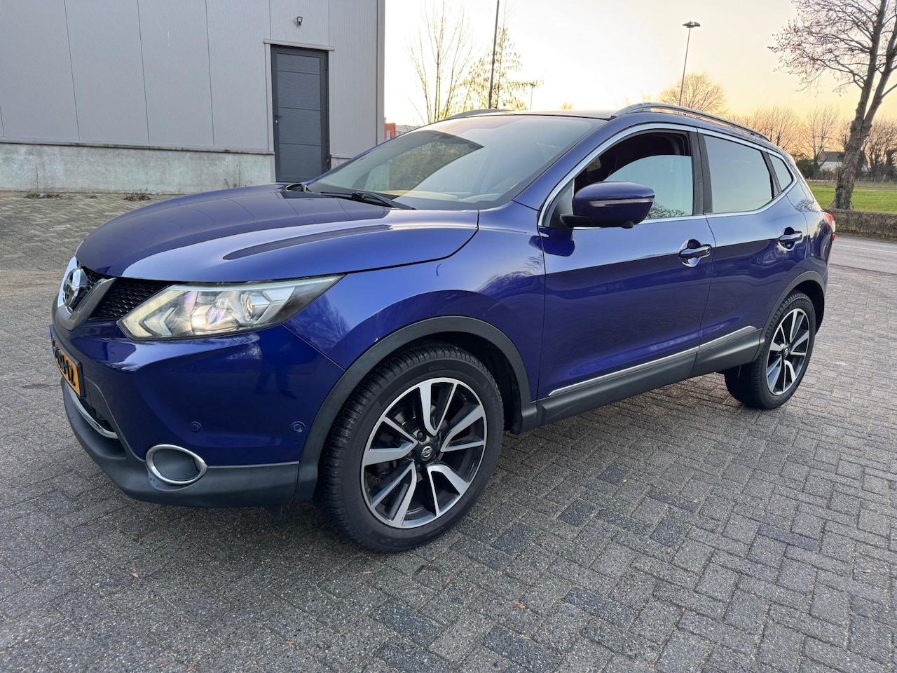 Nissan Qashqai - 1.5 dCi Tekna 360C Keyless Leer Pano StoelV - AutoWereld.nl
