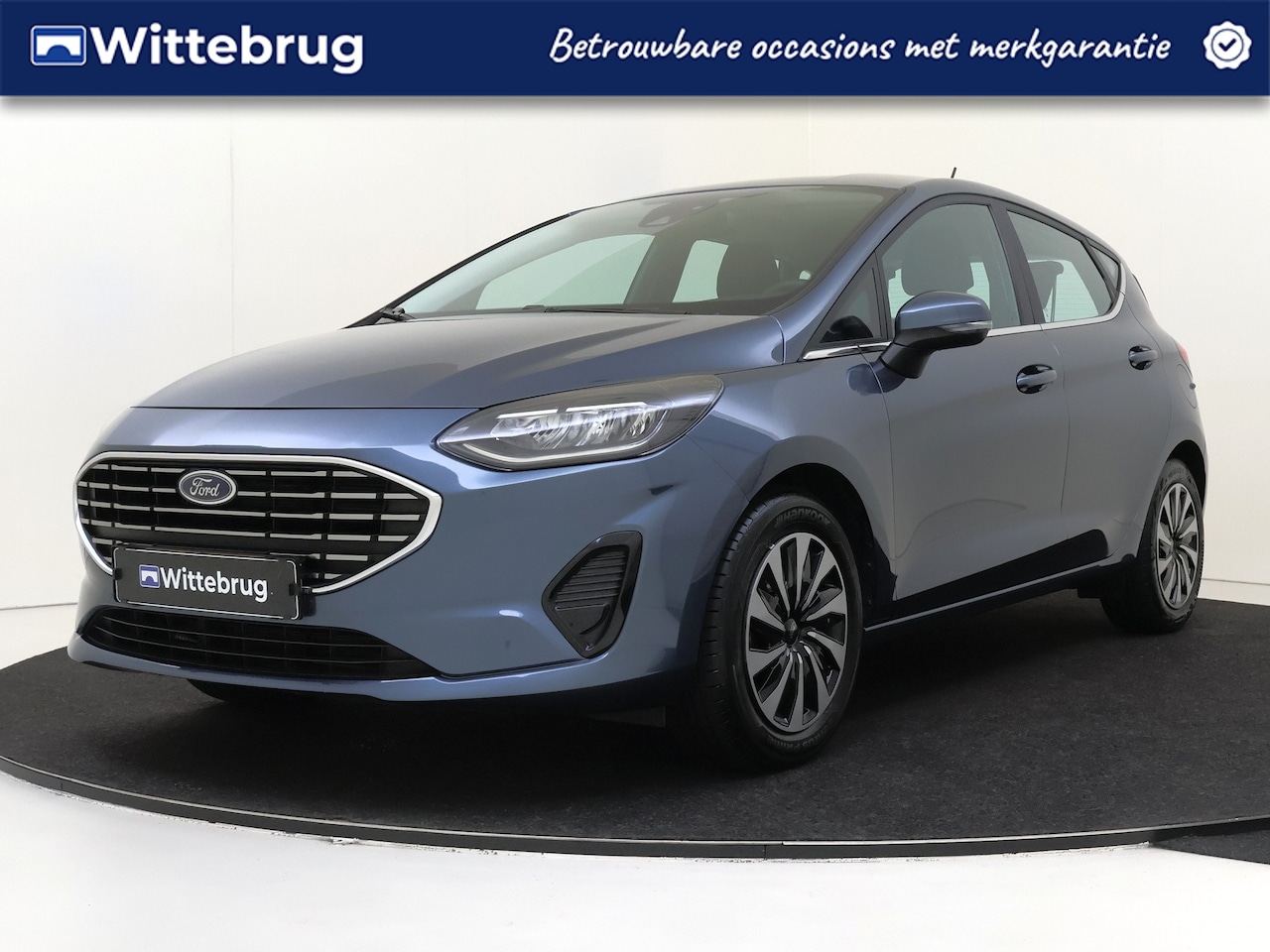 Ford Fiesta - 1.0 EcoBoost Hybrid Titanium Stoelverwarming | Parkeersensoren| Apple Carplay & Android Au - AutoWereld.nl