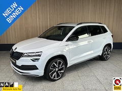 Skoda Karoq - 1.5 TSI Sportline Business NL auto | Trekhaak | Camera | Carplay