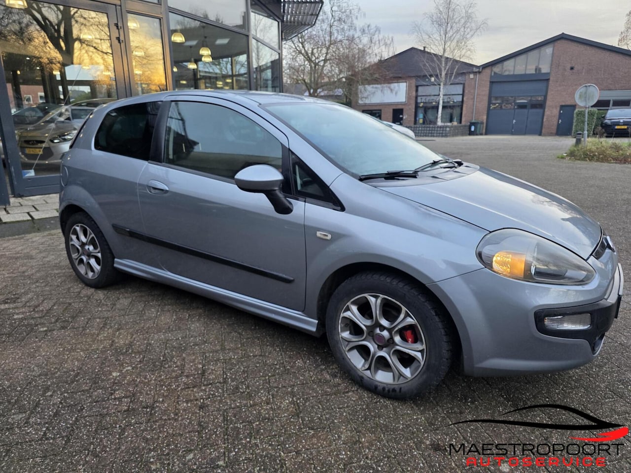 Fiat Punto Evo - | 1.4 Racing | 2010 | Clima | USB | Luxe - AutoWereld.nl