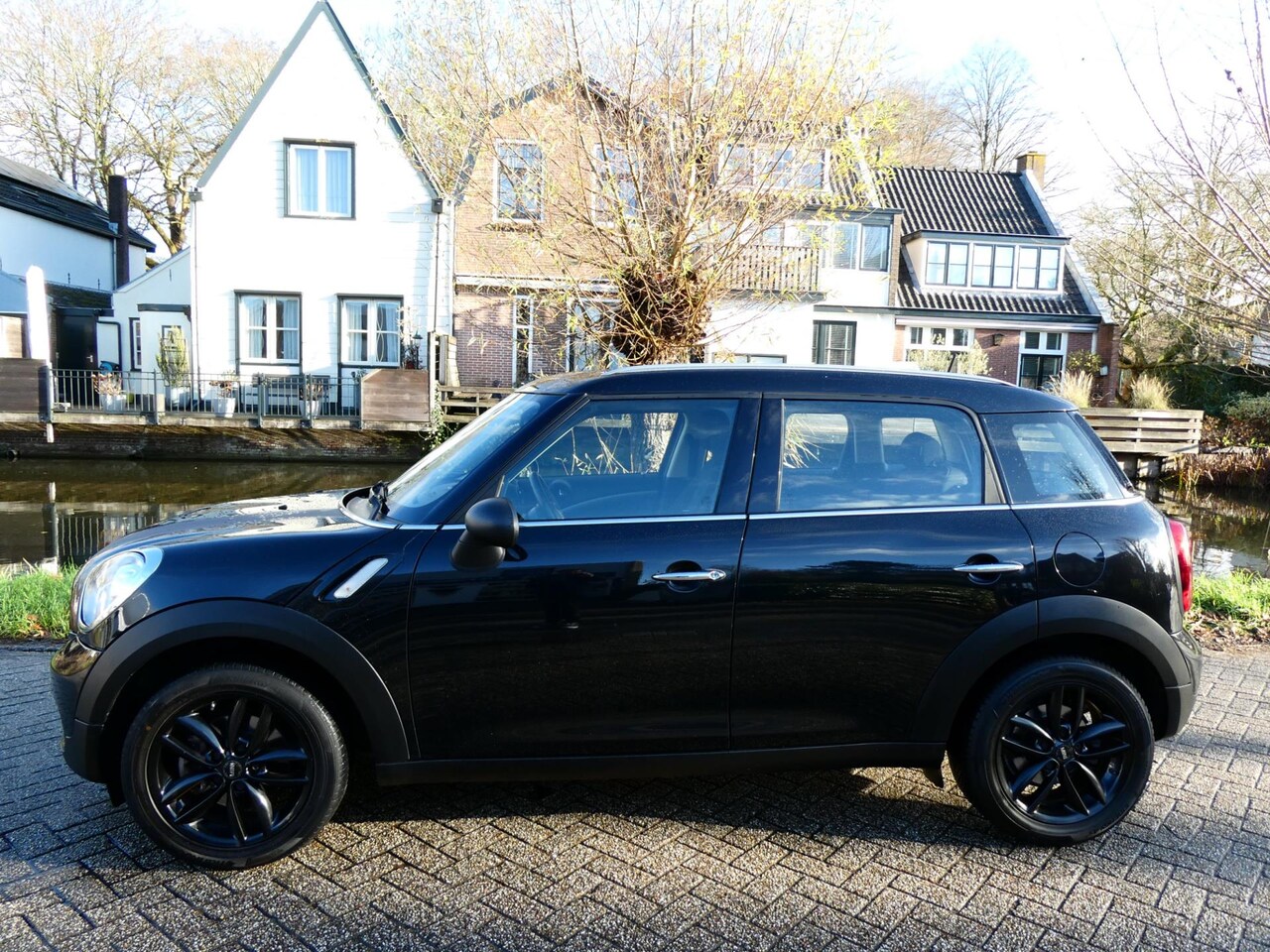 MINI Countryman - Mini 1.6i 98pk 2e eigenaar 136.000km Airco Cruise PDC - AutoWereld.nl