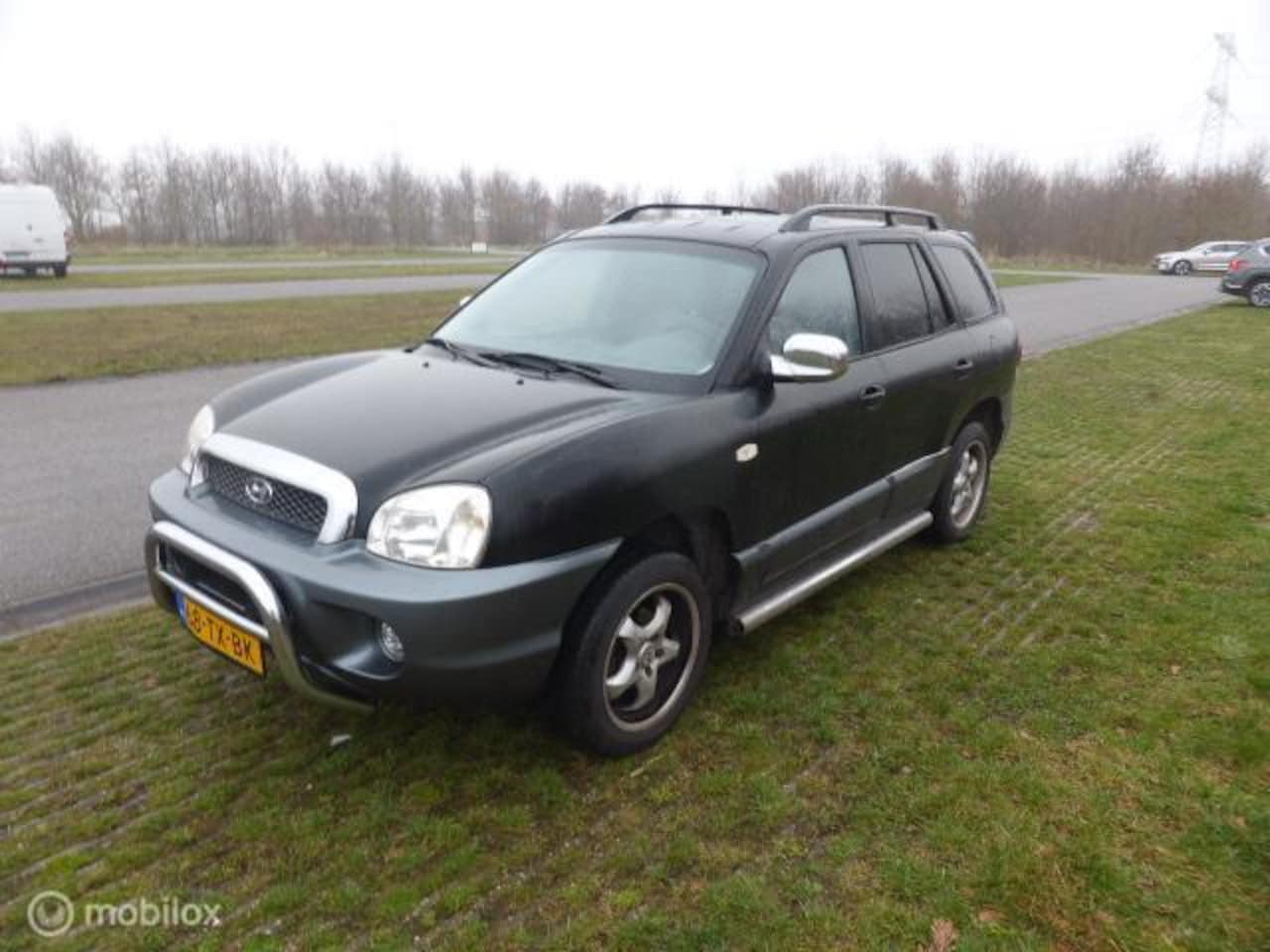 Hyundai Santa Fe - 2.0i-16V Dynamic 2.0i-16V Dynamic - AutoWereld.nl