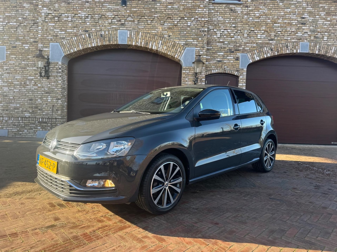 Volkswagen Polo - 1.2 TSI Comfortline Airco/Cruise/Navigatie/Bluetooth/Elekt Ramen/Elekt Spiegels / APK 2027 - AutoWereld.nl