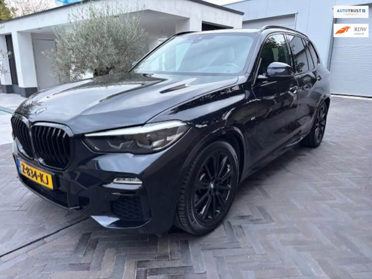 BMW X5 - XDrive45e Carbon zwart M-pakket PANORAMA 394 pk - AutoWereld.nl