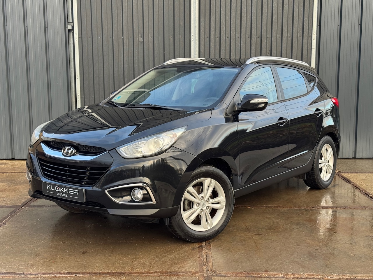 Hyundai ix35 - 2.0i Business Edition Clima | Cruise | Camera | Navi - AutoWereld.nl