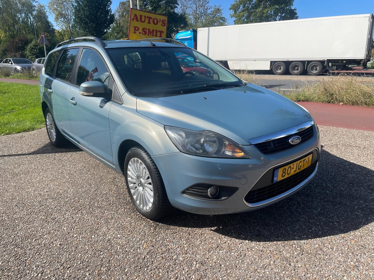 Ford Focus Wagon - 1.8 Titanium Flexi Fuel cruise contr airco nav - AutoWereld.nl