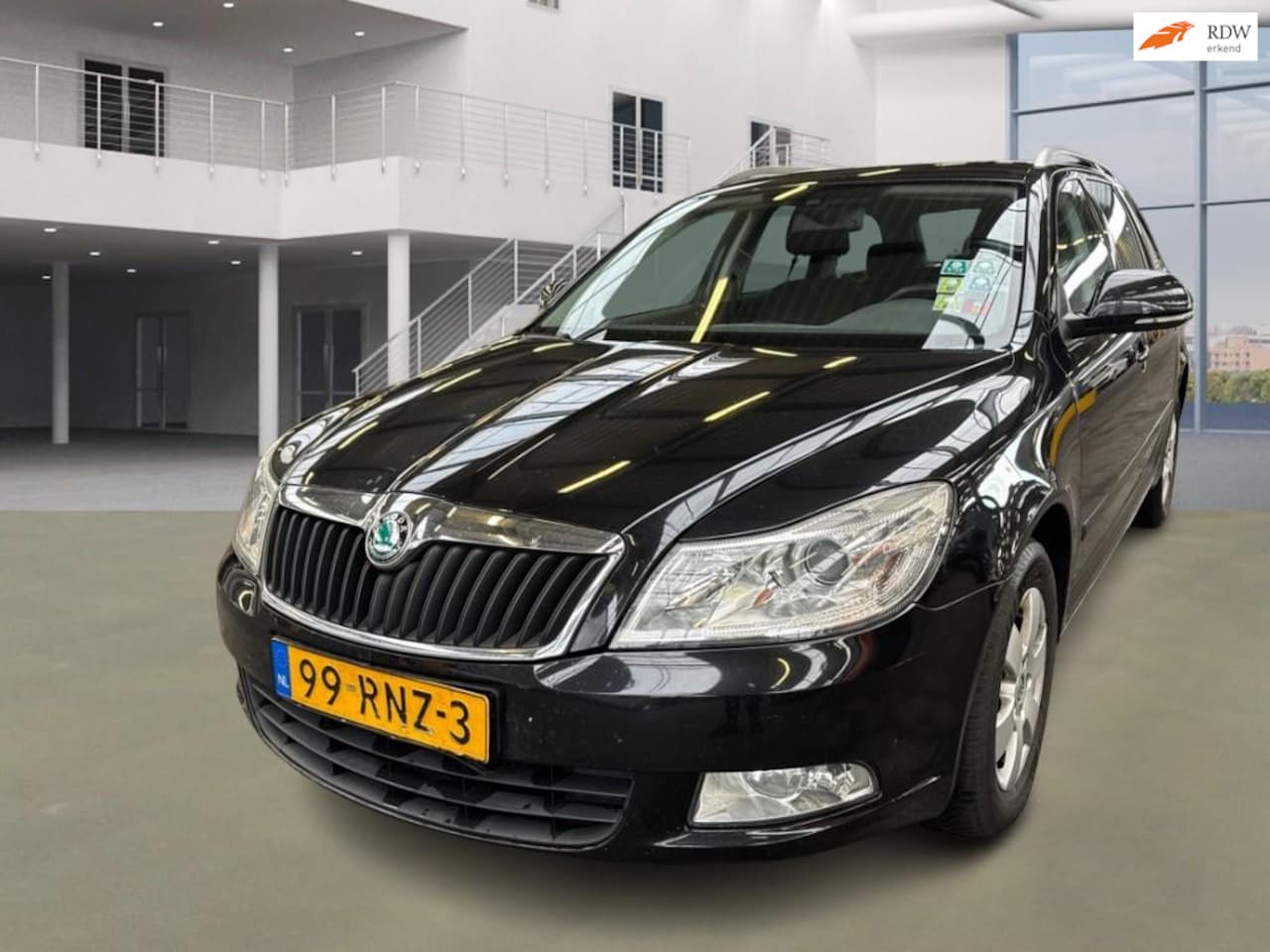 Skoda Octavia Combi - 1.6 TDI Greentech Elegance PSENSOR CRUISE TREKHAAK 2 X SLEUTELS - AutoWereld.nl