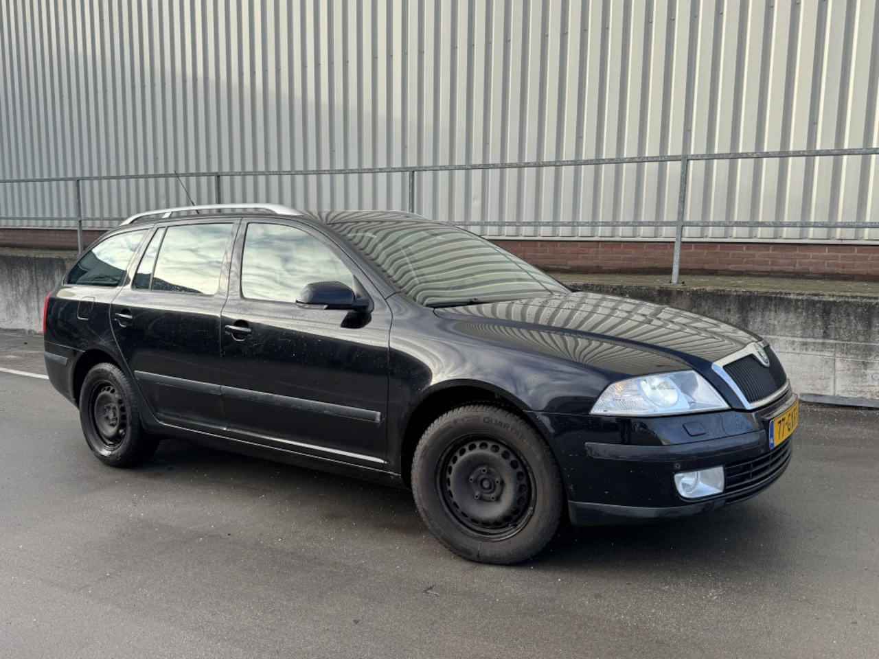 Skoda Octavia Combi - 1.6 FSI Elegance Bns Xenon Navi Klima - AutoWereld.nl