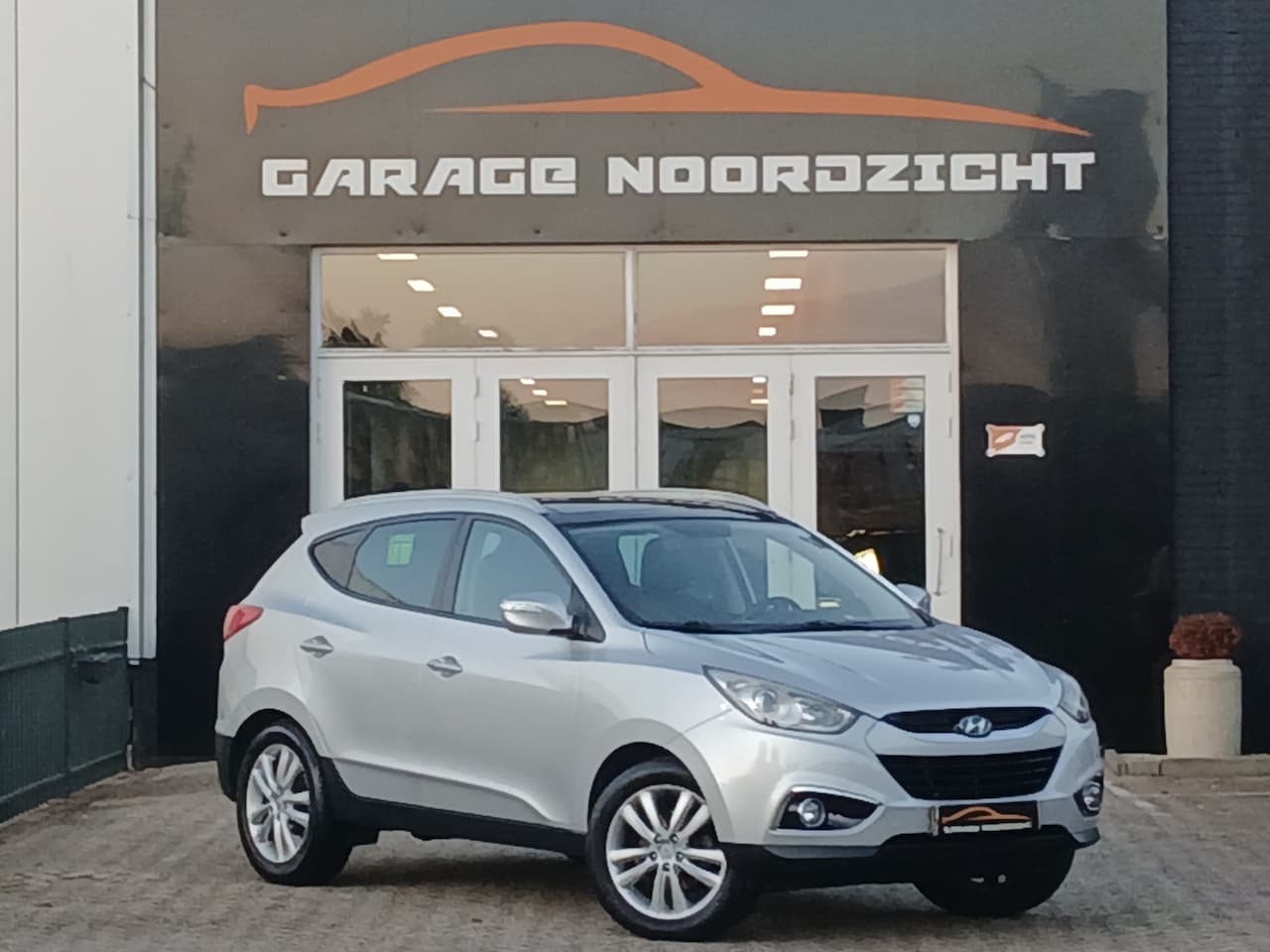 Hyundai ix35 - 2.0i 163pk i-Catcher Edition PANORAMA DAK|NAVIGATIE|CAMERA|CRUISE CONTROL|BLUE TOOTH |LEDE - AutoWereld.nl