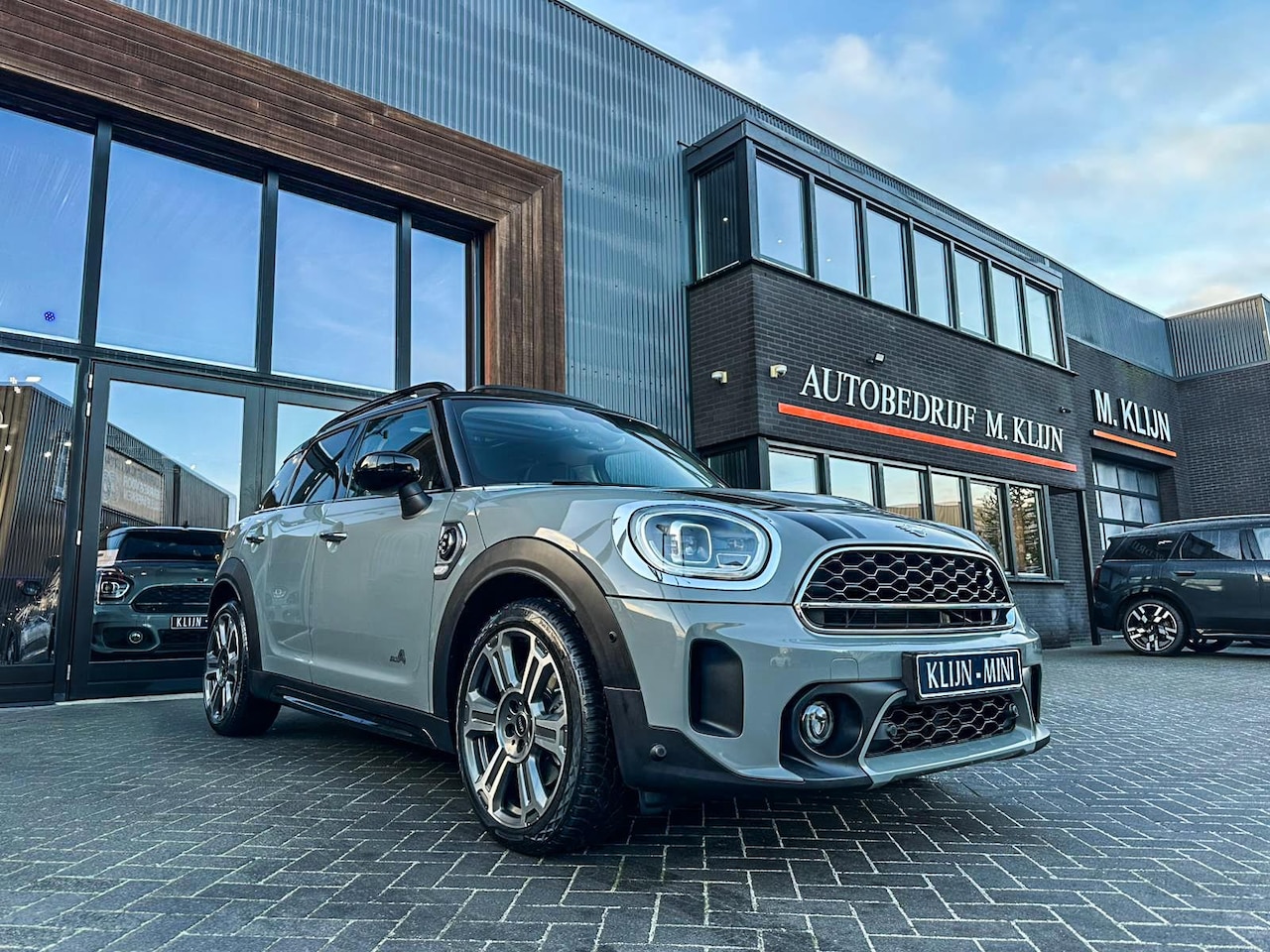 MINI Countryman - Mini 1.5 Cooper S E ALL4 Chili 220pk aut/Nardo/Jcw Interieur/19"/Pano/Camera - AutoWereld.nl