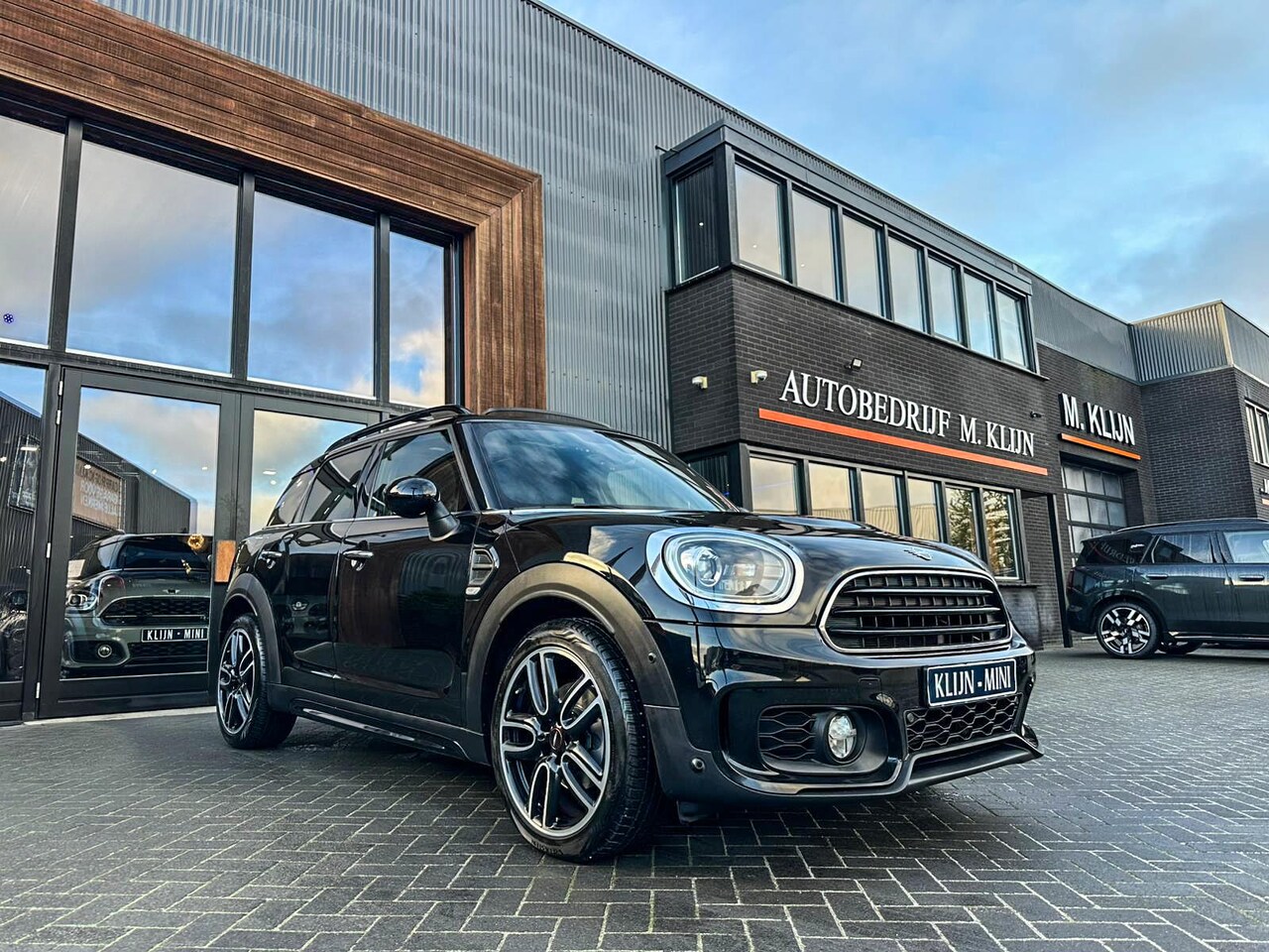 MINI Countryman - Mini 1.5 Cooper aut John Cooper Works/NL auto/Pano/Navi/19"Jcw/Hk/Camera - AutoWereld.nl