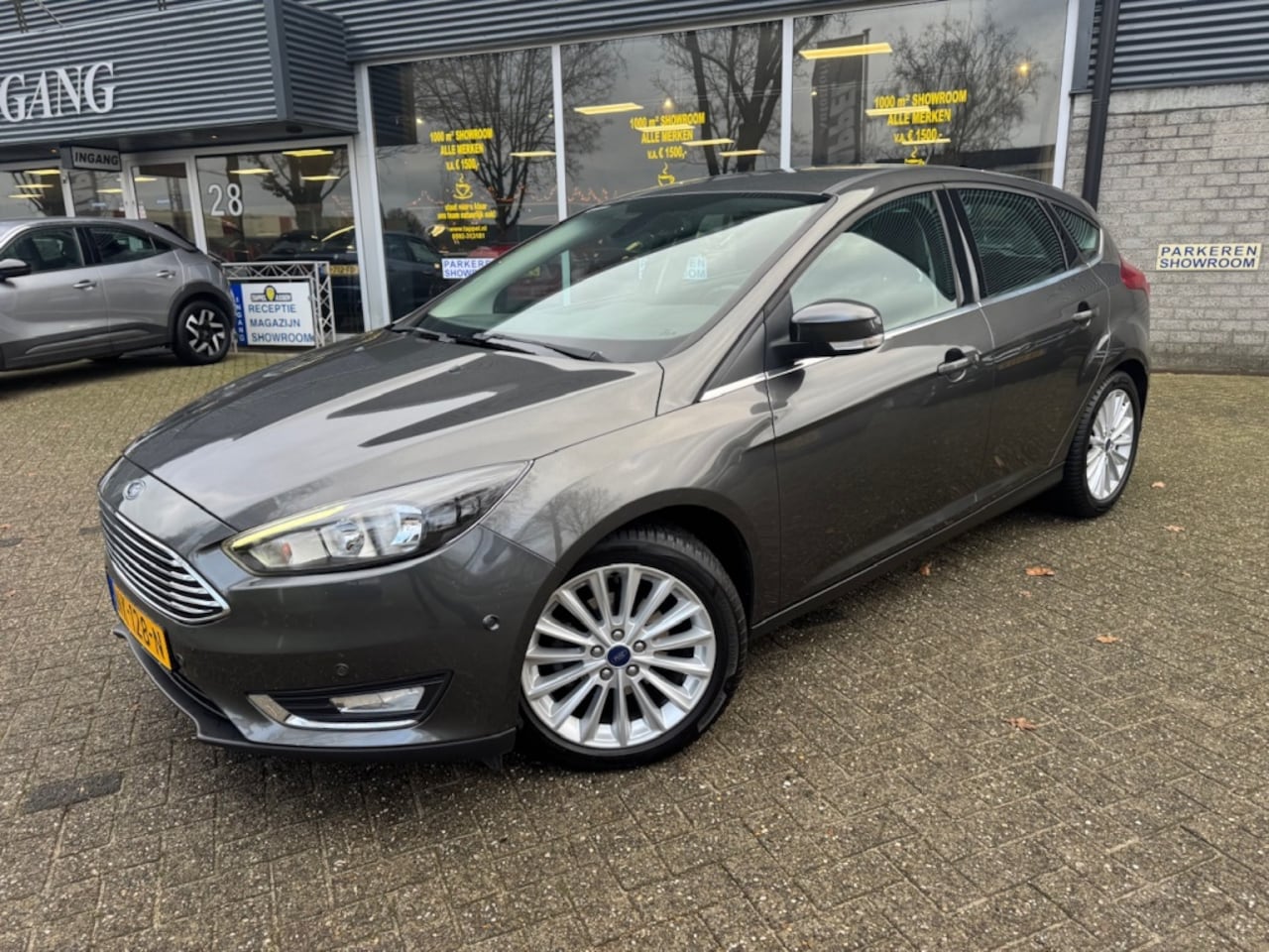 Ford Focus - 1.0 Titanium 125PK Nav/PDC/Cruise/Carplay - AutoWereld.nl