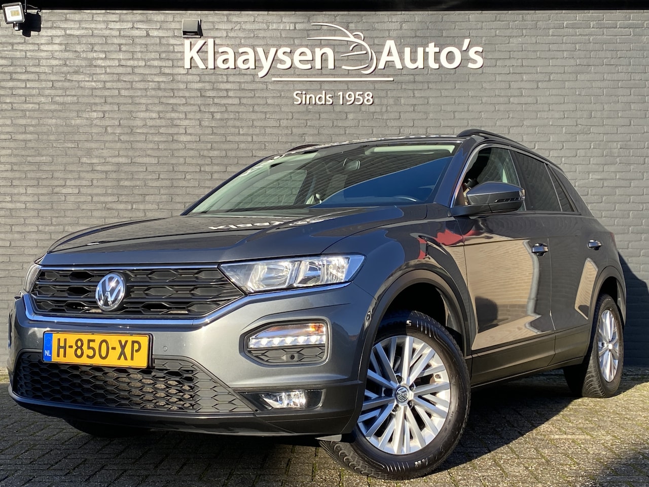 Volkswagen T-Roc - 1.0 TSI Style Business 116 pk | navigatie | stoelverwarming | climate control | adaptieve - AutoWereld.nl