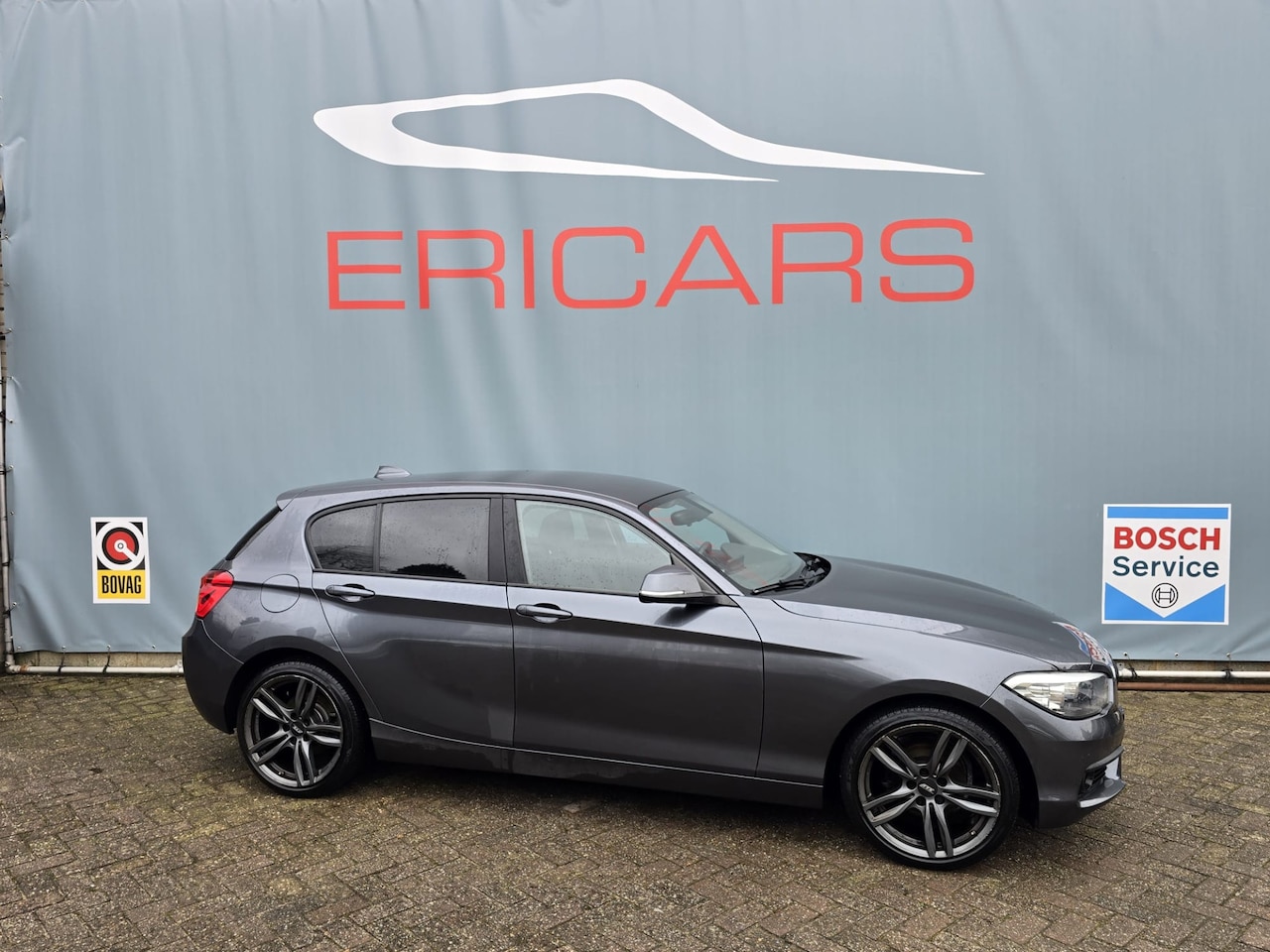 BMW 1-serie - 116i High Executive Leer, Navi - AutoWereld.nl