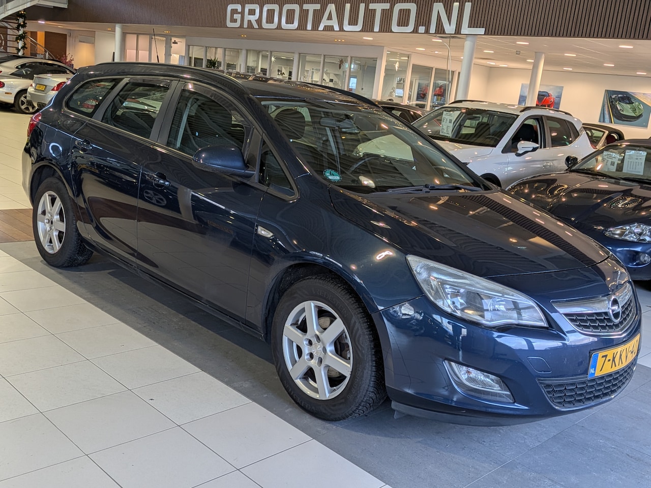 Opel Astra Sports Tourer - 1.4 Turbo Business Edition Airco, Cruise Control, Stuurbekrachtiging - AutoWereld.nl