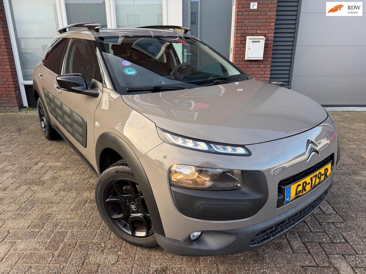 Citroën C4 Cactus - 1.2 PureTech Shine / Navi / Camera / PDC / Clima / NAP - AutoWereld.nl
