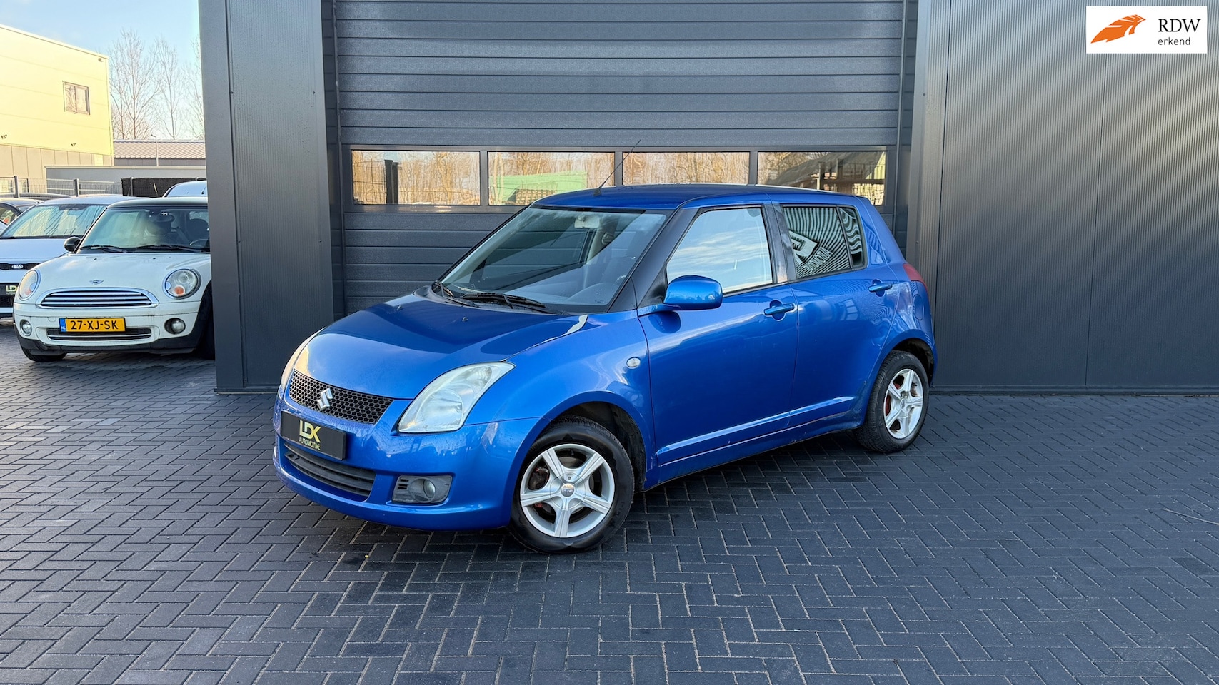 Suzuki Swift - 1.3 Base Airco - AutoWereld.nl