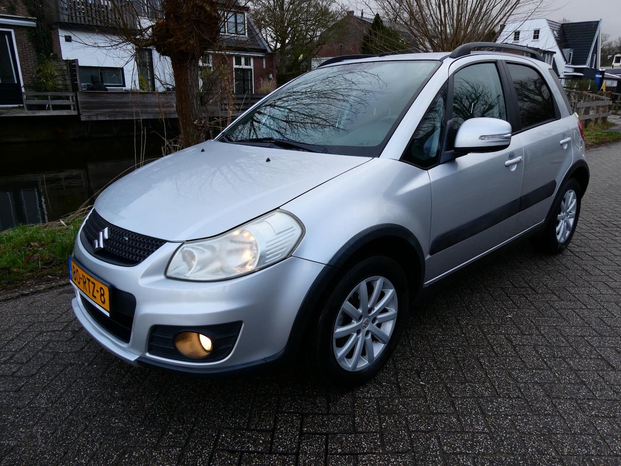 Suzuki SX4 - 1.6 Executive 120pk Clima Cruise Trekhaak 1200kg. Hoge instap - AutoWereld.nl