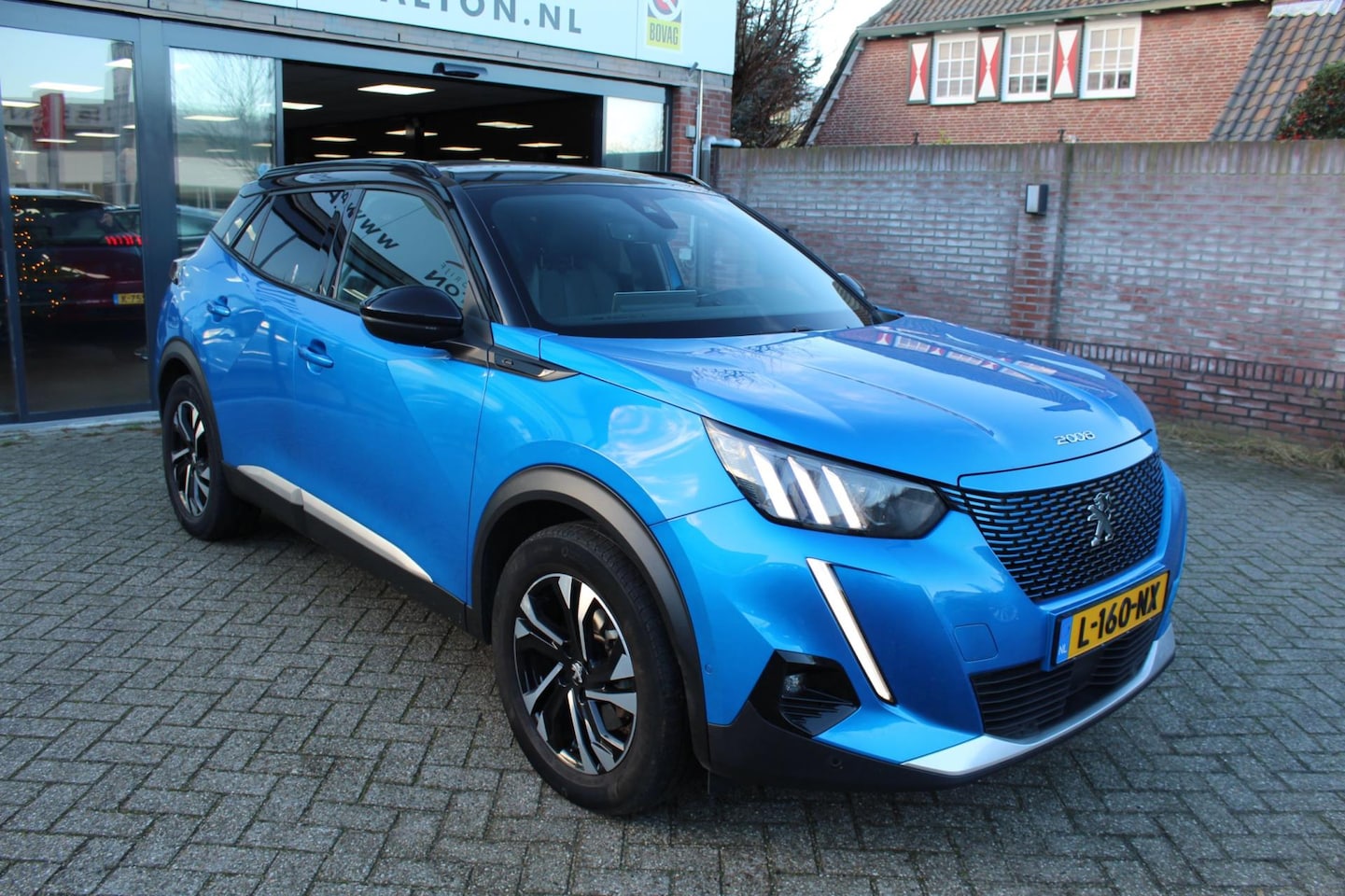 Peugeot e-2008 - EV GT AIRCO / NAVIGATIE / LAGE KM! - AutoWereld.nl