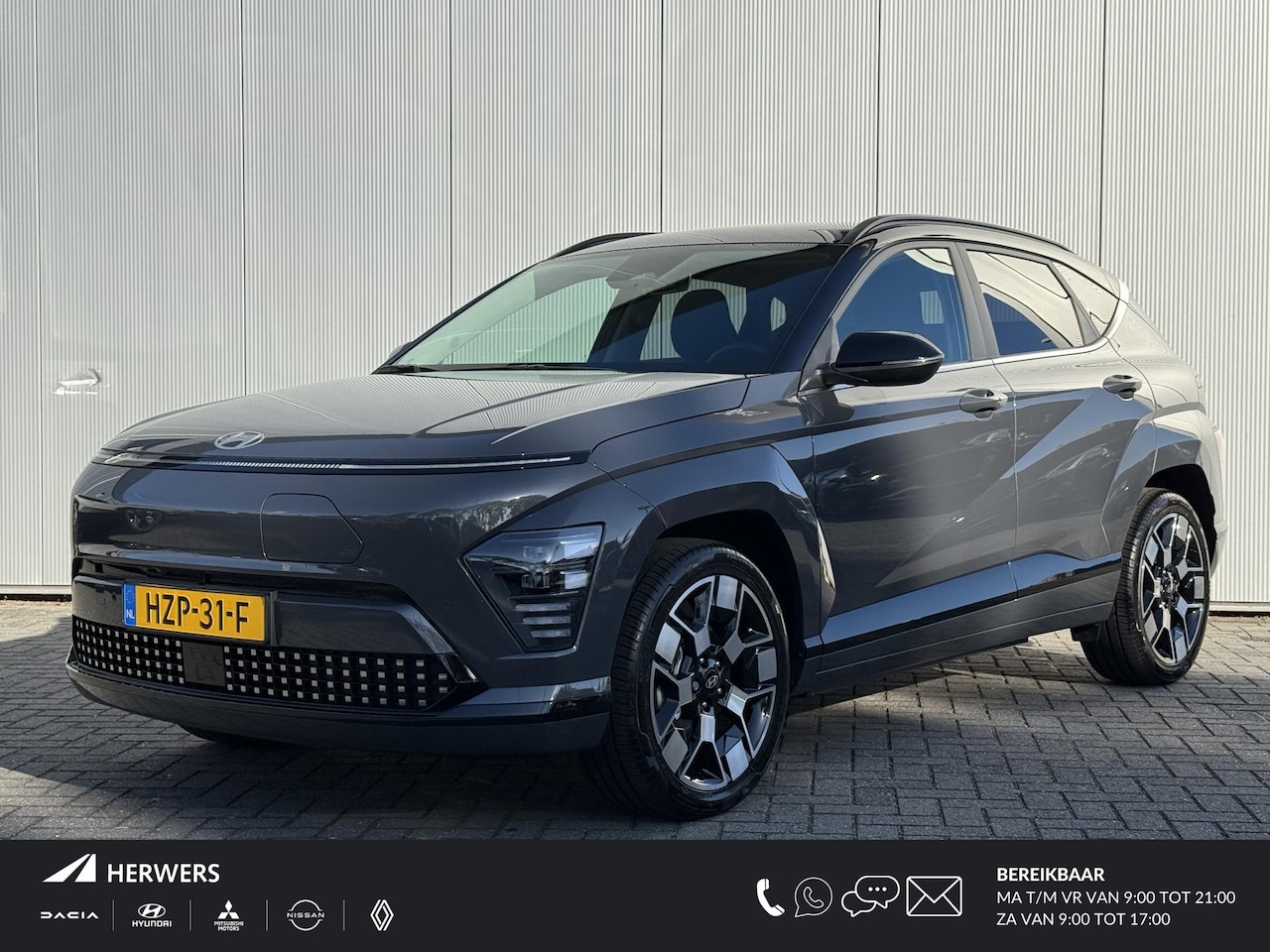 Hyundai Kona Electric - Comfort Smart 65.4 kWh / Navigatie / 19" Lm velgen / Elektrisch bedienbare achterklep / St - AutoWereld.nl