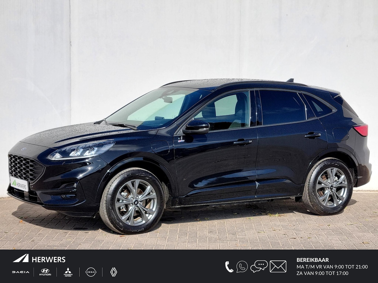 Ford Kuga - 2.5 PHEV ST-Line Automaat / Winter Pack / Navigatie / Camera / Cruise Control / Stoelverwa - AutoWereld.nl