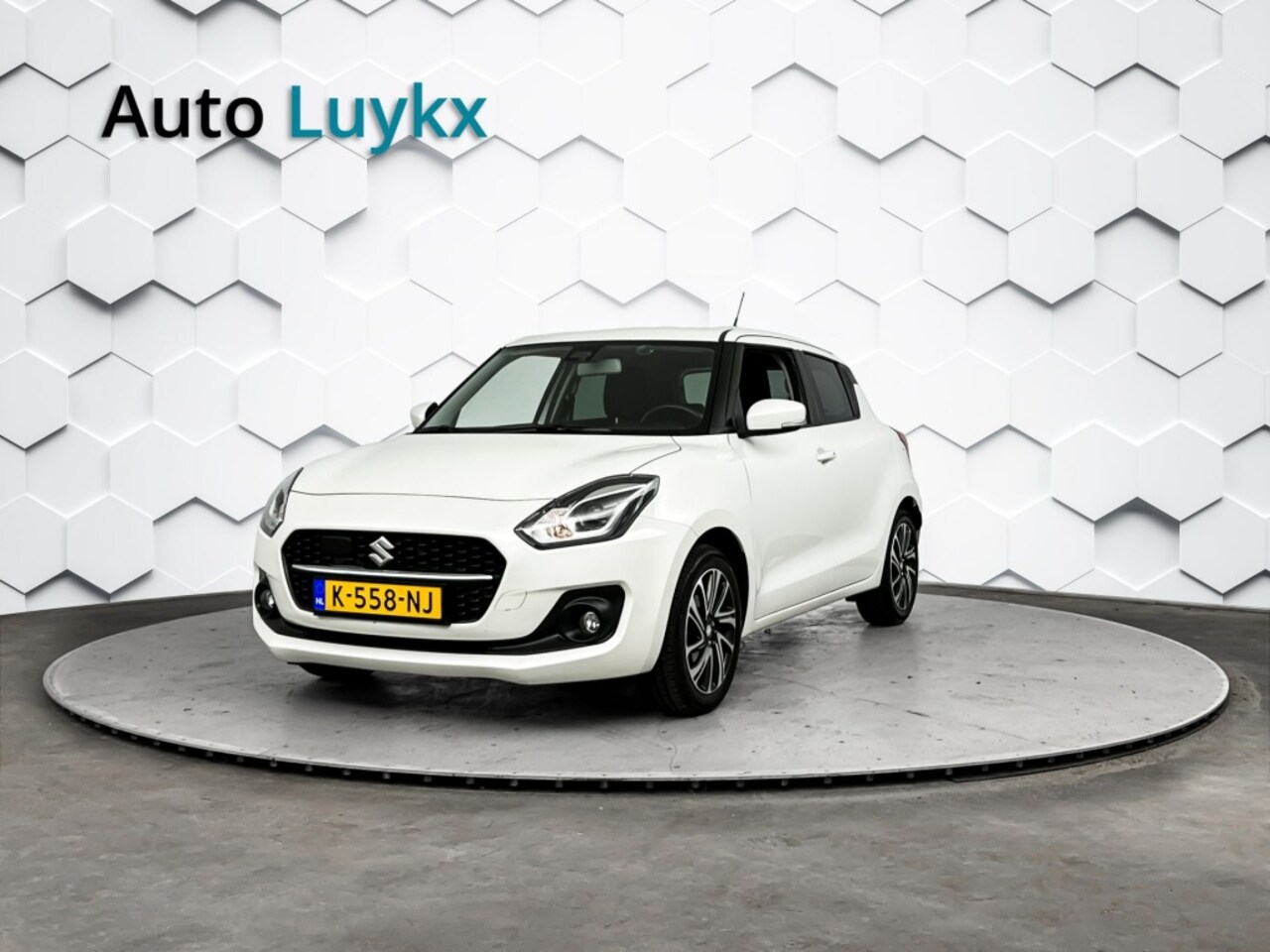 Suzuki Swift - 1.2 Style Smart Hybrid | Navigatie | Adaptieve Cruise Control | Climate Control - AutoWereld.nl