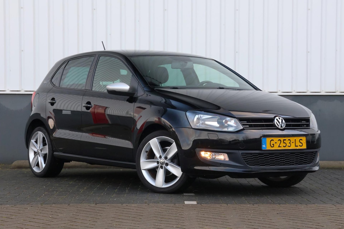 Volkswagen Polo - 1.2-12V Trendline | BLACK LINE edition | Stoelverwarming! - AutoWereld.nl