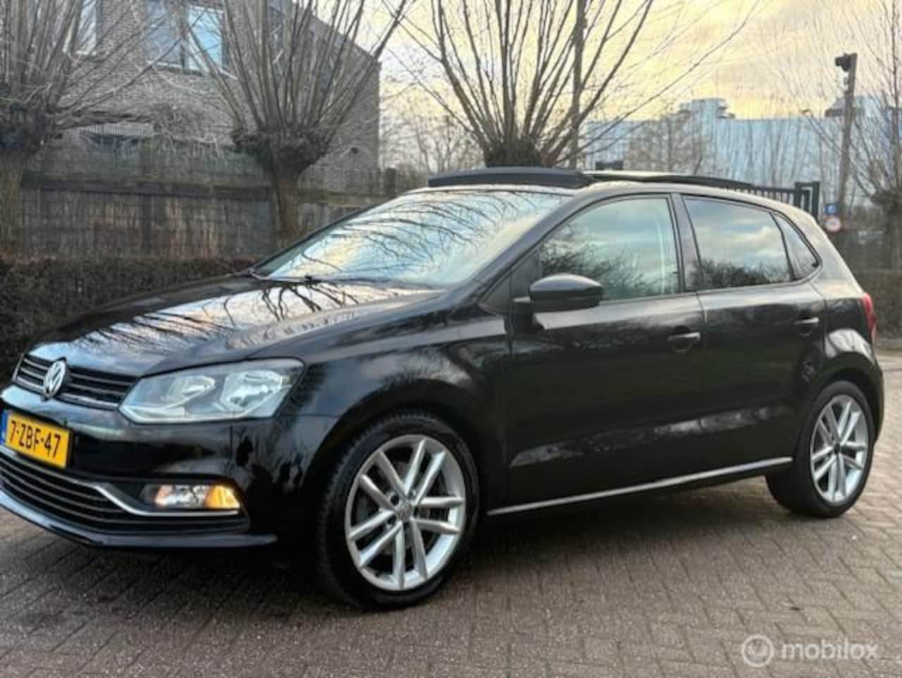 Volkswagen Polo - 1.2 TSI Highline Pano Aut. Leer! - AutoWereld.nl
