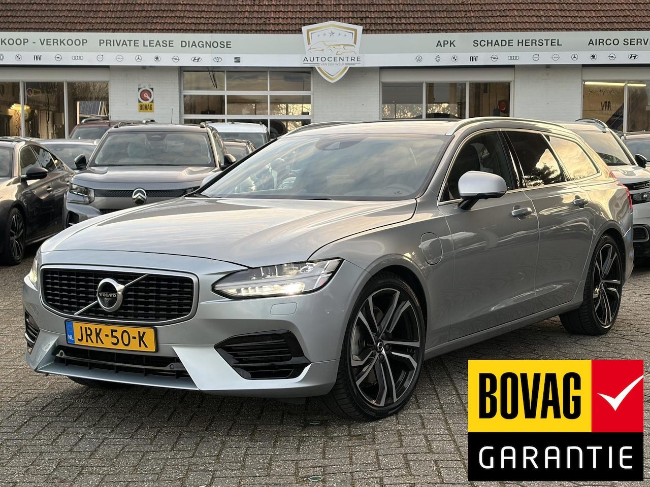 Volvo V90 - 2.0 T8 AWD R-Design PANO | TREKHAAK | NAVI | BOVAG !! - AutoWereld.nl