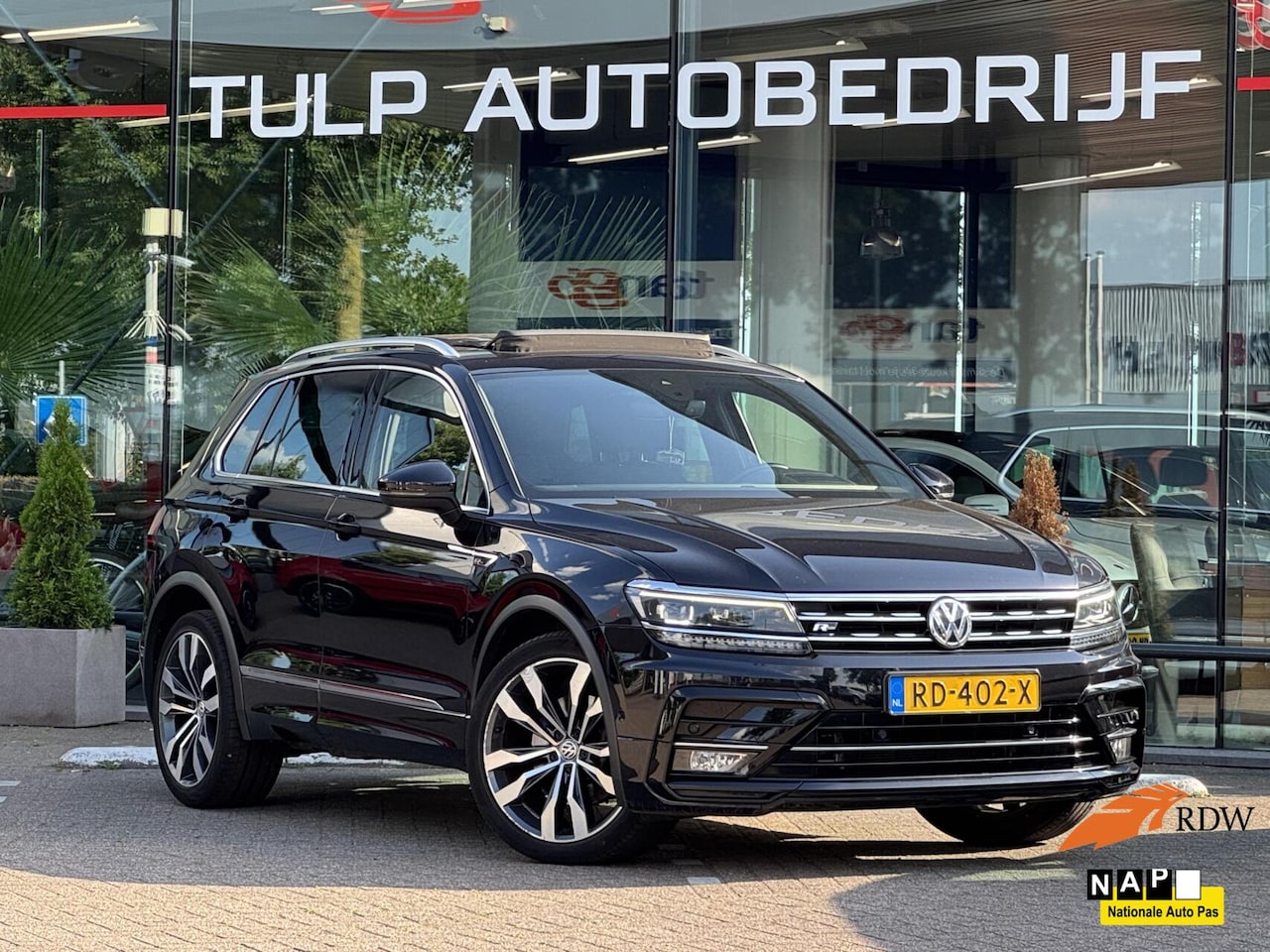 Volkswagen Tiguan - 2.0 TSI 4Motion Highline R-Line DSG 2017 - AutoWereld.nl