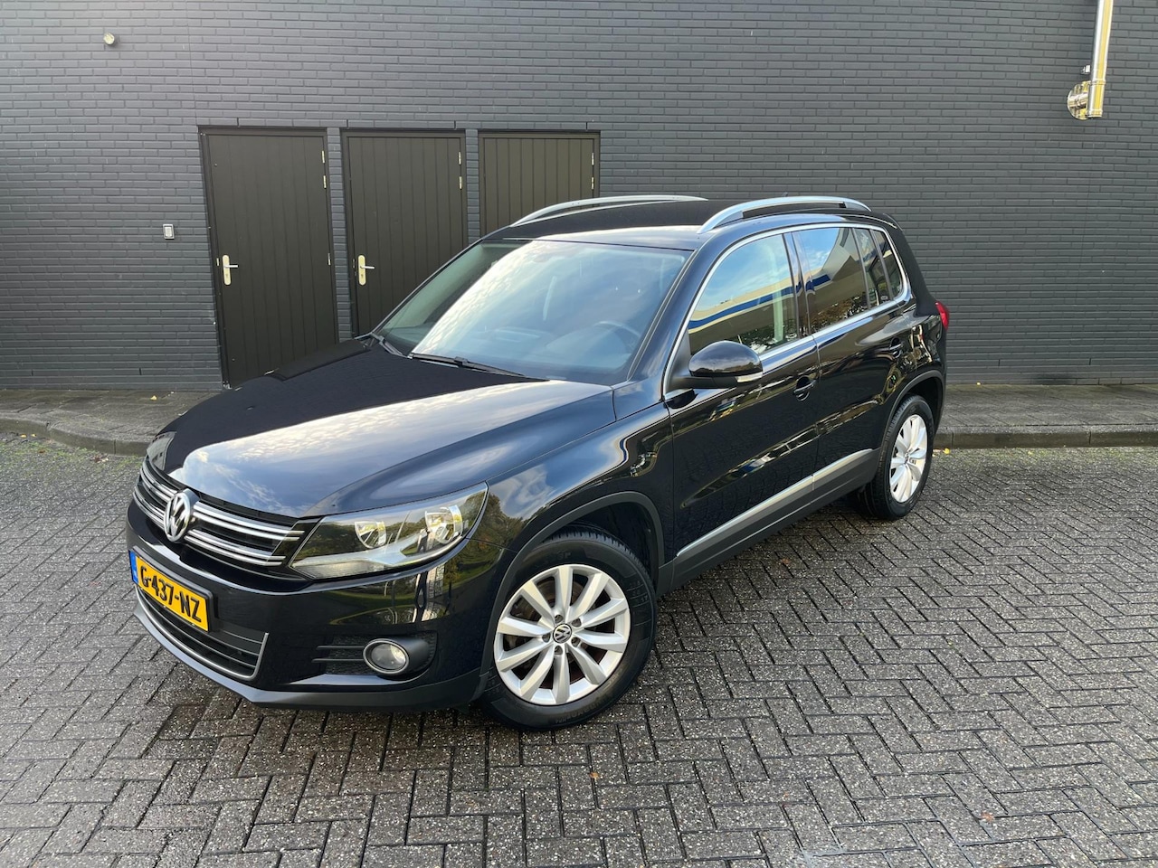 Volkswagen Tiguan - 1.4 TSI Sport&Style Automaat - AutoWereld.nl