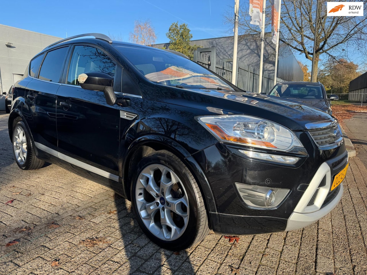 Ford Kuga - 2.5 20V turbo 4x4 automaat individual , trekhaak , navi, cruise, elec pakket, xenon, leder - AutoWereld.nl