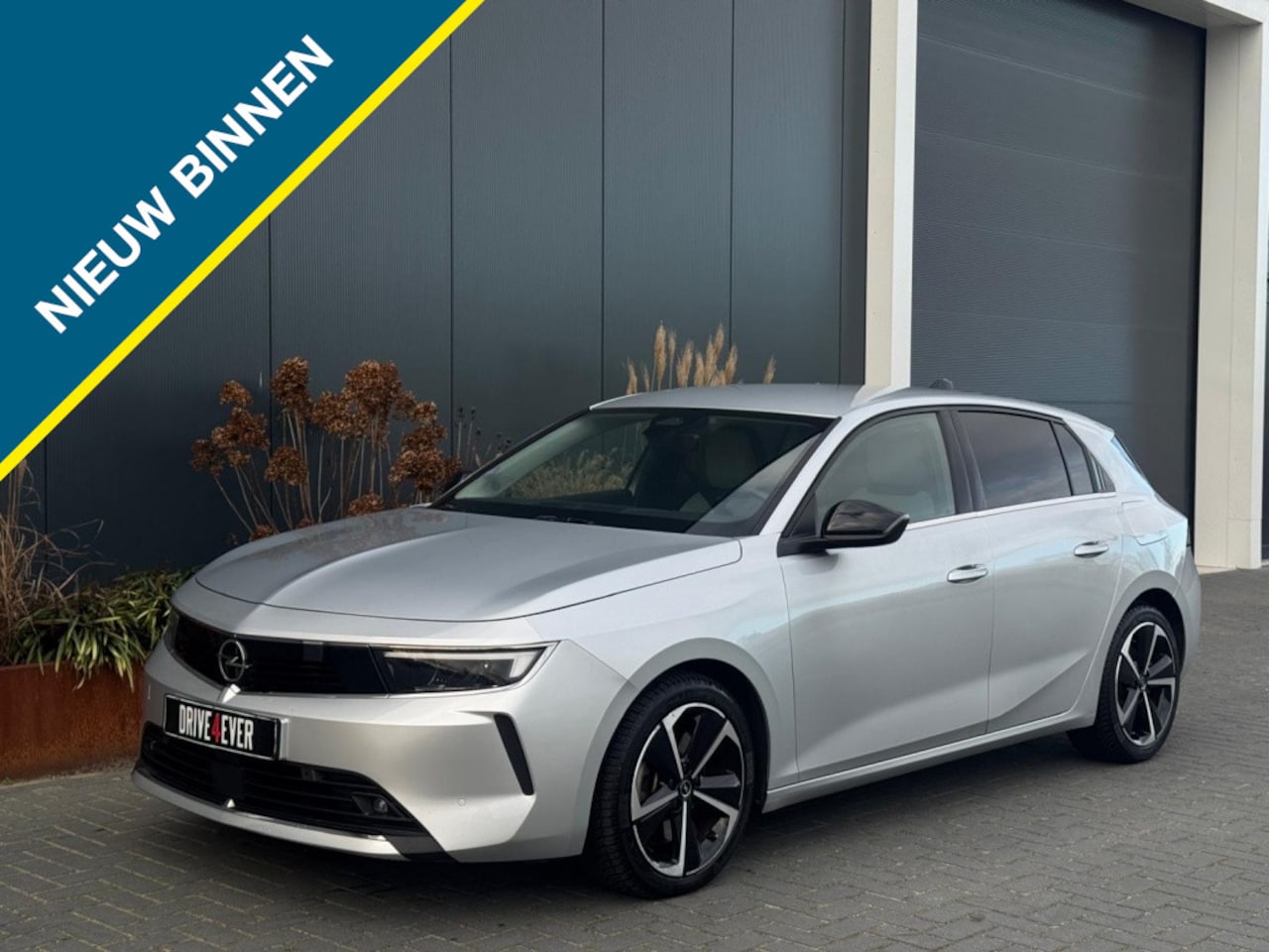 Opel Astra - 1.6 Hybrid Elegance M23 NAVI ACC ECC 360 CAMERA LED SPORTVELGEN - AutoWereld.nl
