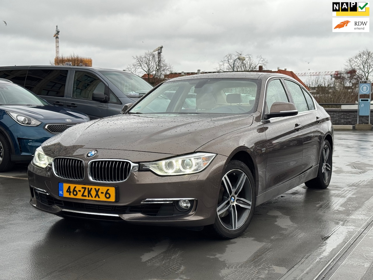 BMW 3-serie - 320i High Executive CarPlay Leer Cruise Navi Nette Auto - AutoWereld.nl