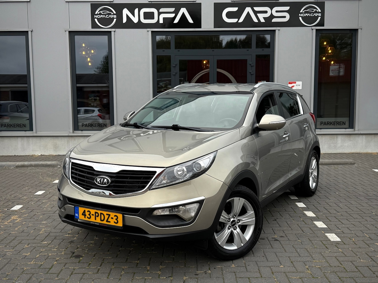 Kia Sportage - 2.0 X-ecutive Plus Pack|Trekhaak|Camera|Automaat|Navi|Nap - AutoWereld.nl