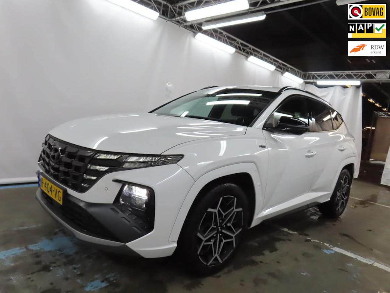 Hyundai Tucson - 1.6 T-GDI HEV N Line 180PK+Led+Leder+19"Lmv+camera+adaptive-cruise+breed-navigatie+vitrual - AutoWereld.nl