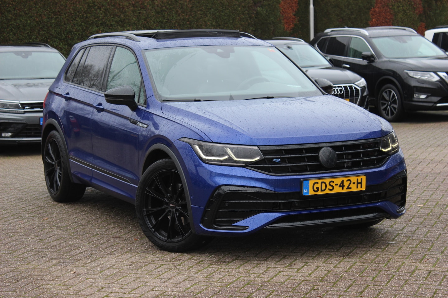 Volkswagen Tiguan - 1.5 TSI R-Line Business+ / Trekhaak / Panoramadak / Camera / Leder / 20'' / CarPlay / Virt - AutoWereld.nl