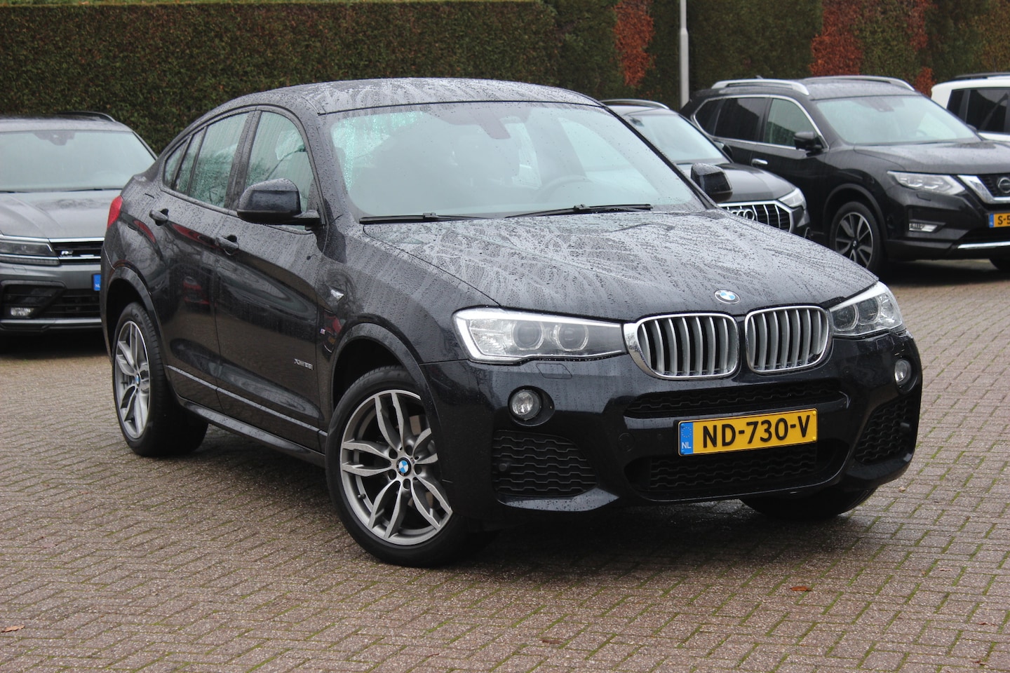 BMW X4 - xDrive28i Centennial High Exe. M Sport / Dealer onderh. / Camera / Leder / Navigatie / 18' - AutoWereld.nl