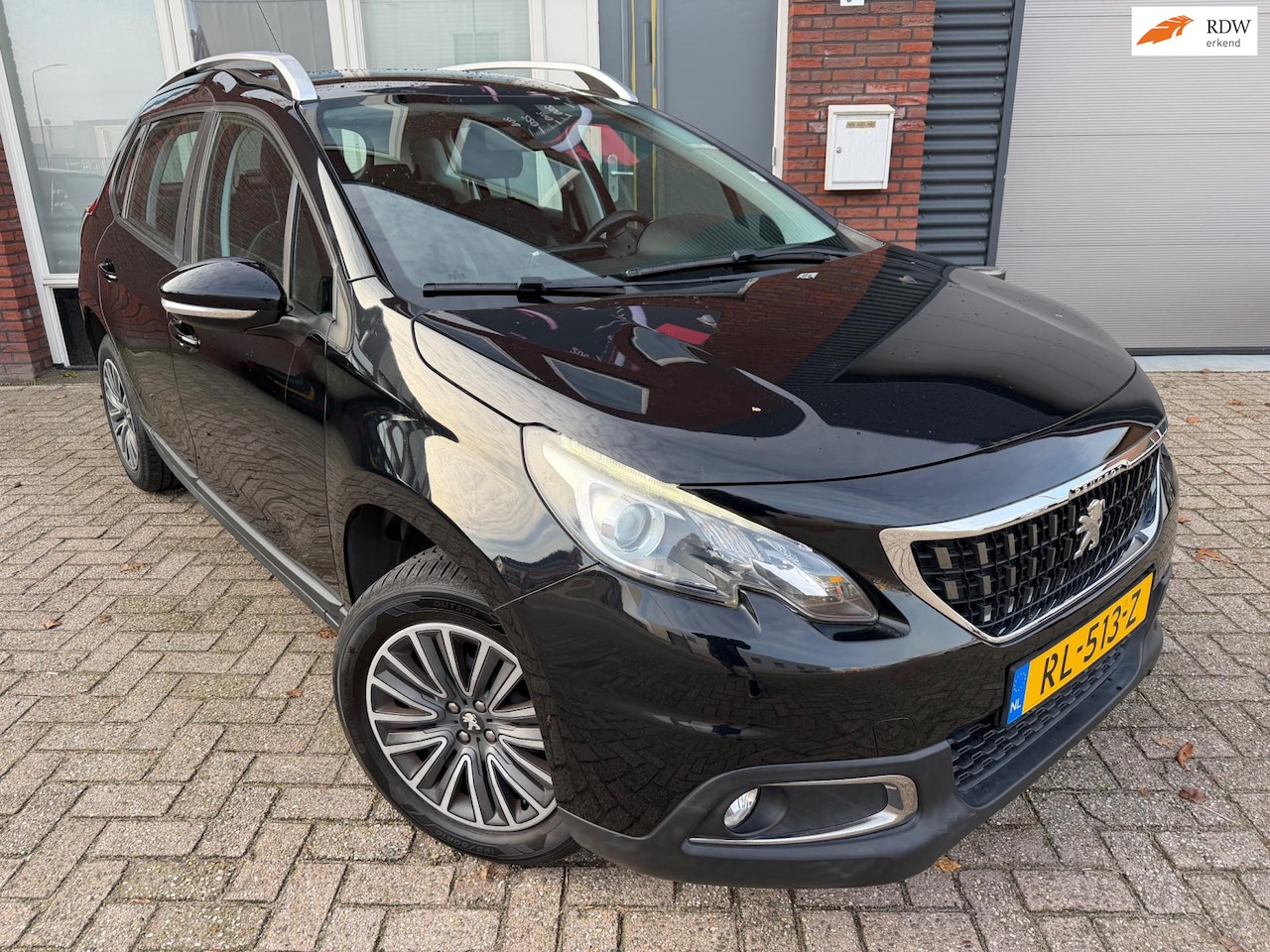 Peugeot 2008 - 1.2 PureTech Blue Lion / Navi / PDC / Unieke km - AutoWereld.nl